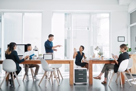 Shot of a team of businesspeople working together in a modern office