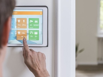 Woman using smart home screen