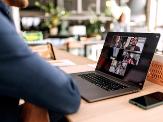 Close up of businessman having online meeting in the office