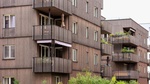 Mehrfamilienhaus Wohnungen Holz-Fassade Balkone